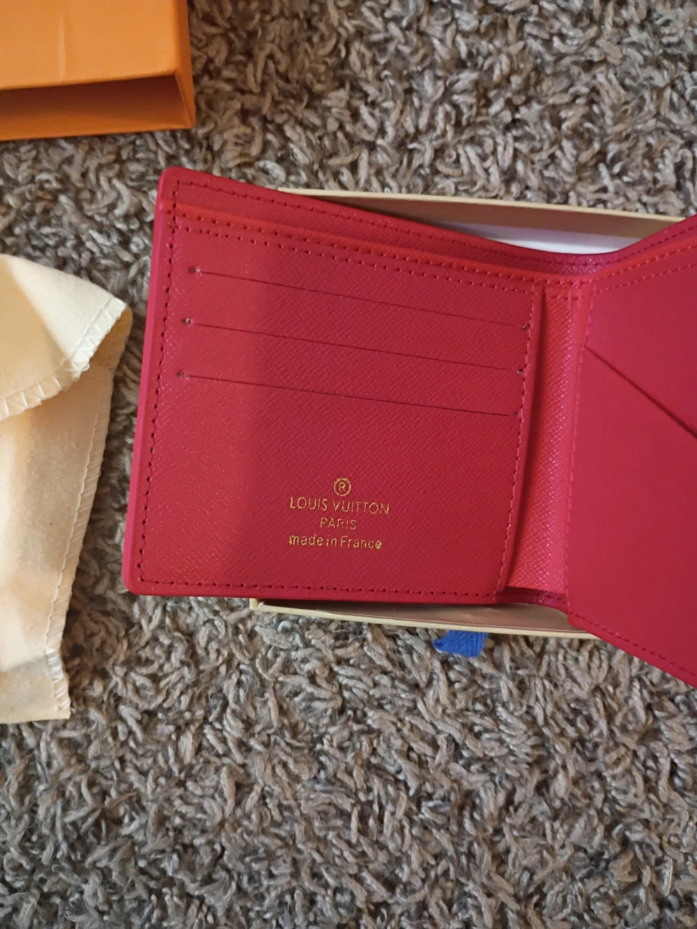 Louis Vuitton Red Bi-Fold Wallet with White Script